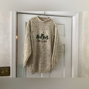 Creamy-yellow wool sweater bought in Ireland. Only worn once. No size listed.